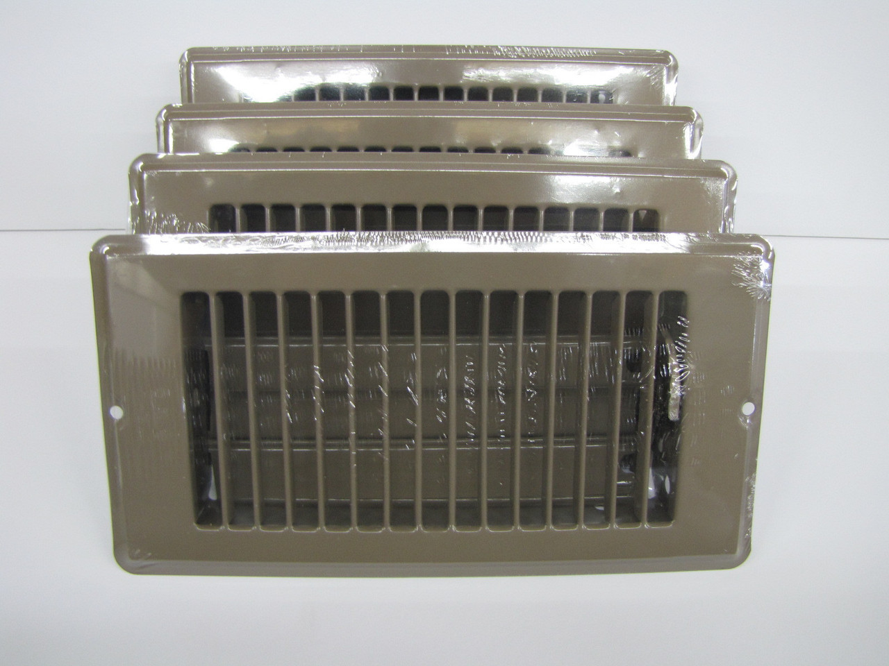 4" x 8". Brown Metal Floor Vent Register.  Lot of 4