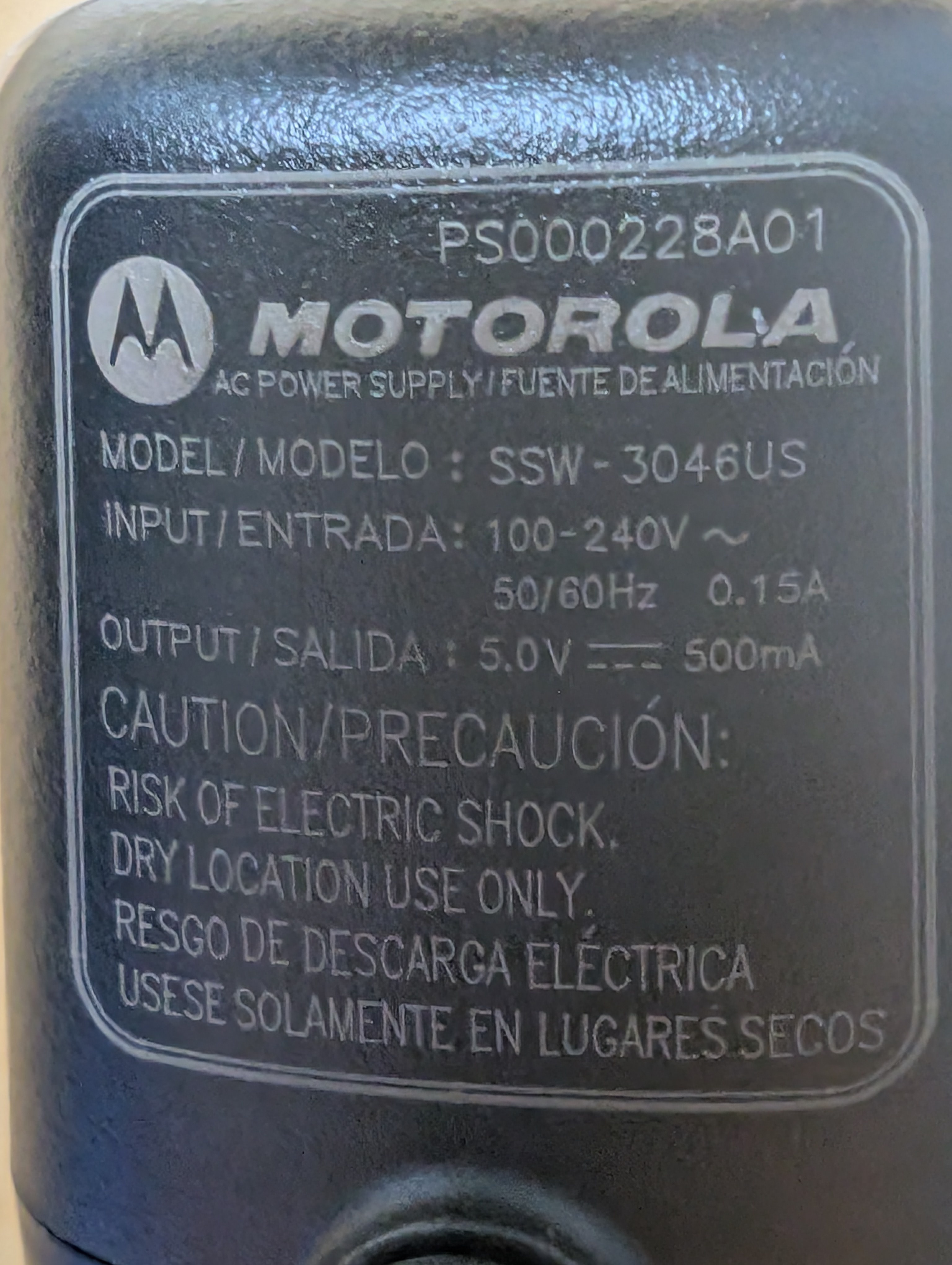 Motorola PS000228A01 power supply label showing 5V DC 500mA output