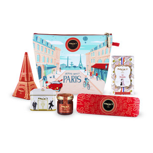 Bonjour pouch filled with assorted Maxim’s de Paris chocolates in Paris-themed packaging.