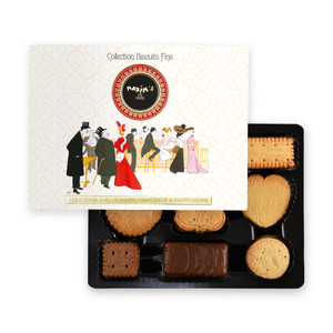 Elegant Maxim’s de Paris metal gift tin filled with an assortment of 32 fine French biscuits and cookies, displayed on a white background.