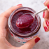 Close-up of rich raspberry and elderberry jam texture, showing thick fruit spread and artisanal quality made in small batches.