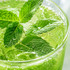 close up mint syrup drinks with sparkling water and mint leaves
