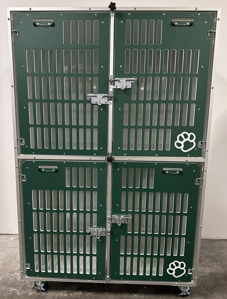 Double stacked kennel with slotted gates in forest green.
