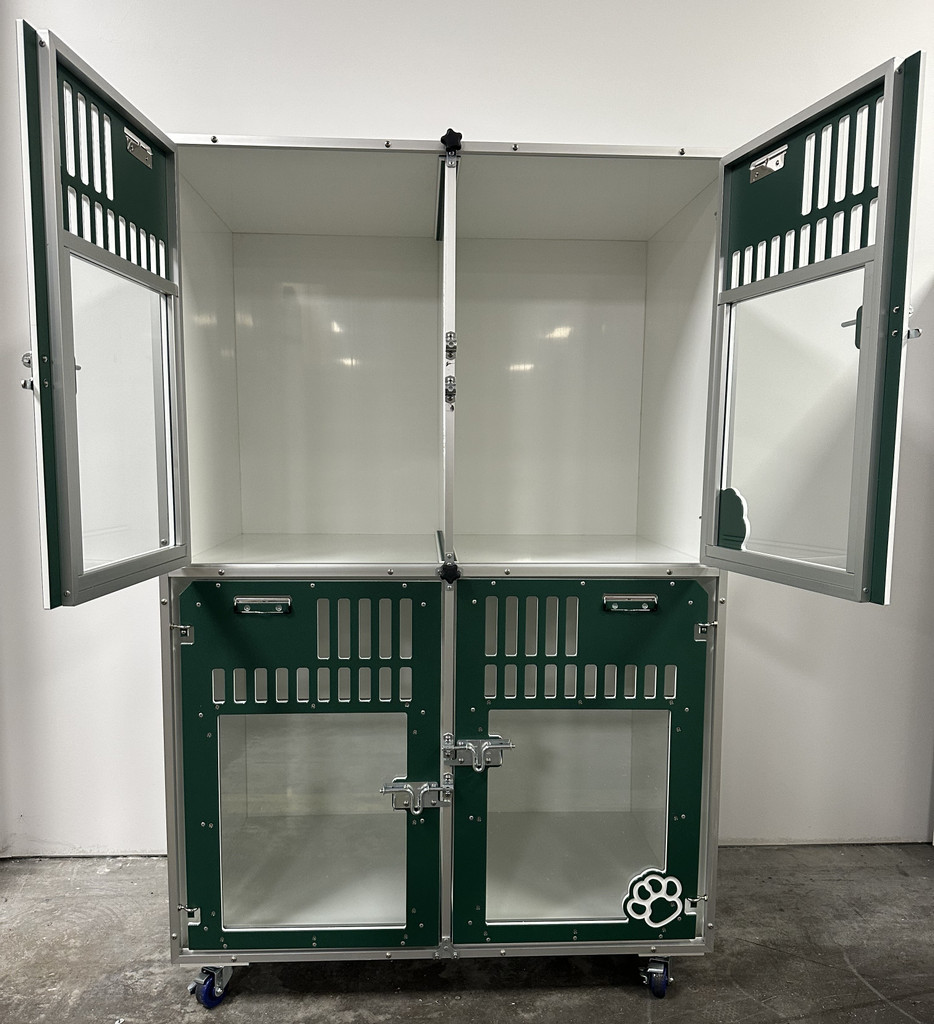 Double stacked kennel with forest green glass doors.