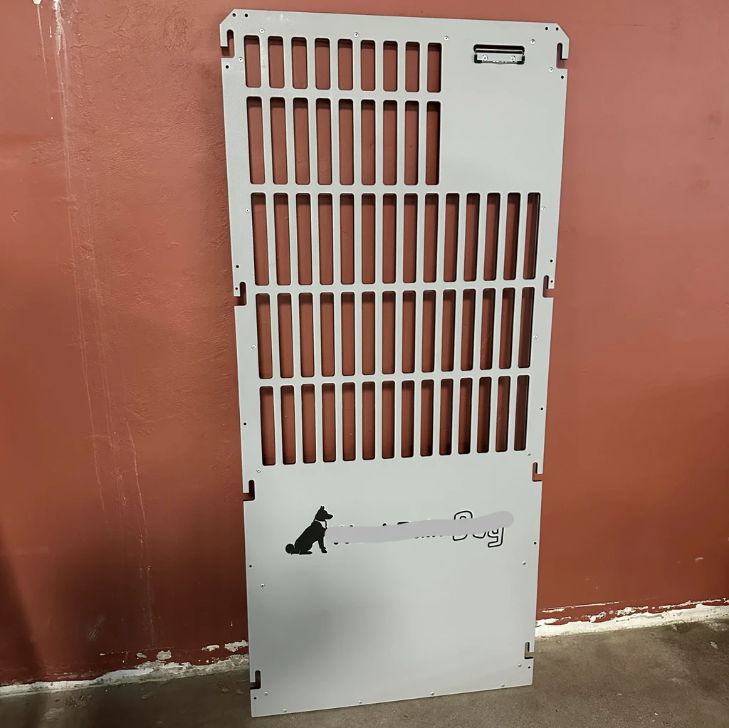 Custom 40" wide grey kennel gates. A logo cover plate will be added to each gate to cover the original logo. Gates are used, so they may have some scratches, but this damage is only cosmetic.