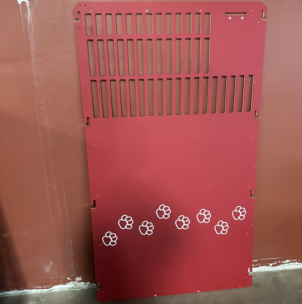 Standard 4ft wide, red kennel gate. Gate features our standard running paw prints