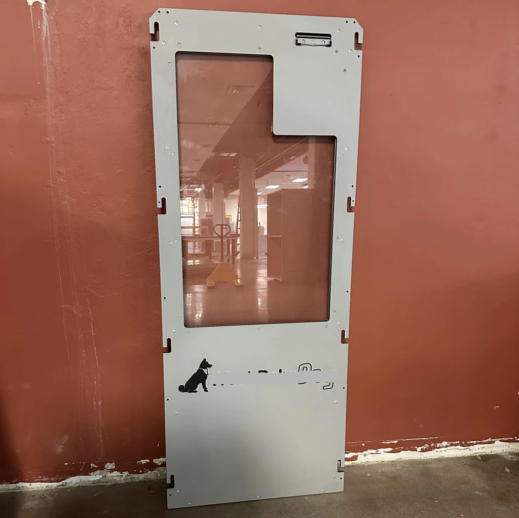 custom 40" wide grey kennel doors. A logo cover plate will be added to each door to cover the original logo. Doors are used, so they may have some scratches, but this damage is only cosmetic.