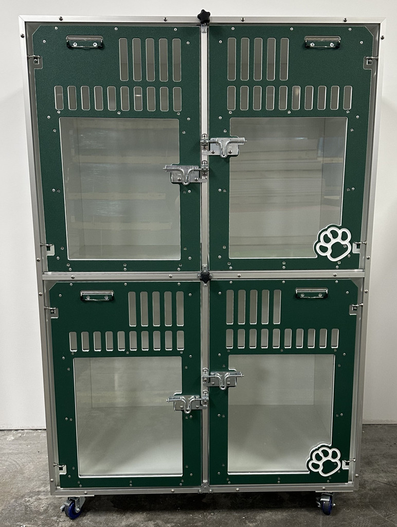Double stacked kennel with glass doors in forest green.