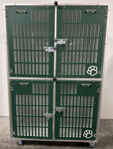 Double stacked kennel with slotted gates in forest green.