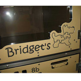Bridget's Pet Resort's custom logo on their kennel gates.