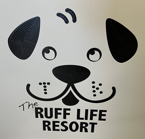 The Ruff Life Resort Custom Logo Engraved on a Gator Kennels Door in Grey