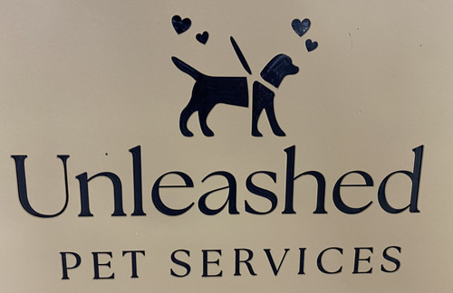 Unleashed Pet Services Custom Logo Engraved on a Gator Kennels Gate in Tan