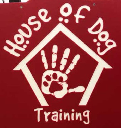 House of Dog Training Signature Series dog kennels in classic red with their custom logo.
