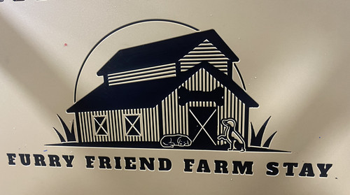 Furry Friend Farm Stay's custom logo engraved on a tan Gator Kennels gate
