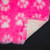 Pink Profleece vetbed with white paw-prints.