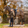 Horse and rider with the LeMieux Loire Classic General Purpose Saddle Pad in Ginger