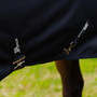 Surcingles on the navy Premier Equine Stratus 1200 Series 100g Turnout Rug with Classic Neck Cover