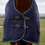 Front closure on the navy WeatherBeeta Comfitec Plus Dynamic High Neck Turnout Rug 100g