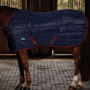 Side profile of the WeatherBeeta ComFiTec 210D Channel Quilt Stable Rug 220g in Navy/Burgundy
