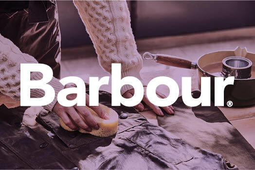 Barbour Logo with wax jacket in background