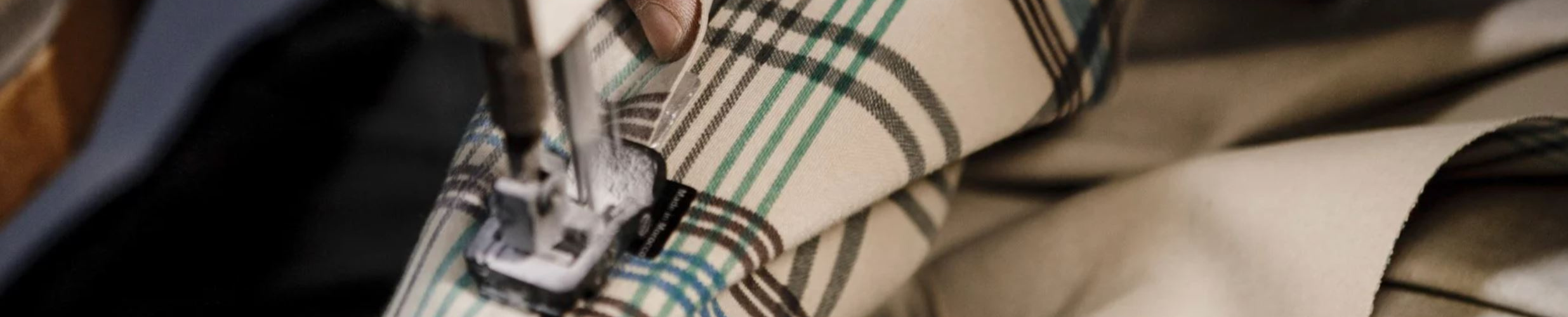 Jersey lining being sewn into a pair of wellington boots