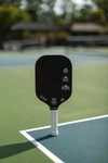 "SPIRIT" edgeless midweight (8.0 oz) raw carbon fiber pickleball paddle with 15mm foam edge honeycomb core