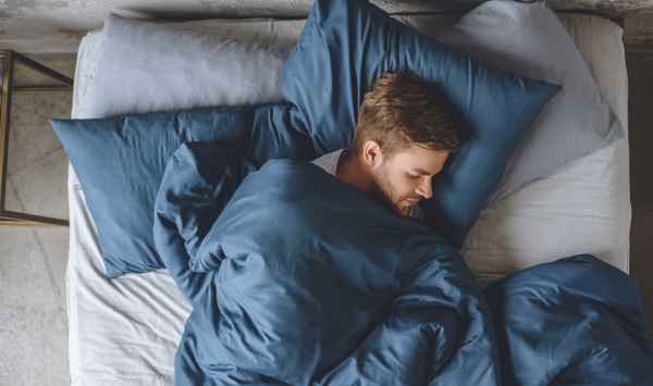 Sleep aids and supplements shown alongside people resting in bed and nighttime imagery to represent sleep support.