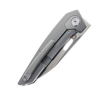 Folding utility blade with white handle and streamlined carry profile