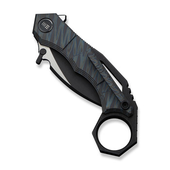 WE Tayra Folding Knife Karambit Tiger Stripe Flame Titanium/Black Titanium Integral Backspacer & Finger Ring Handle M390 Plain Edge Hand Rubbed Black SW/Satin Flat Finish WE24069-4 WE Tayra Folding Knife Karambit Tiger Stripe Flame Titanium/Black Titanium Integral Backspacer & Finger Ring Handle M390 Plain Edge Hand Rubbed Black SW/Satin Flat Finish WE24069-4
