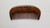 Ivy leaf motif design dark brown wooden comb - front view