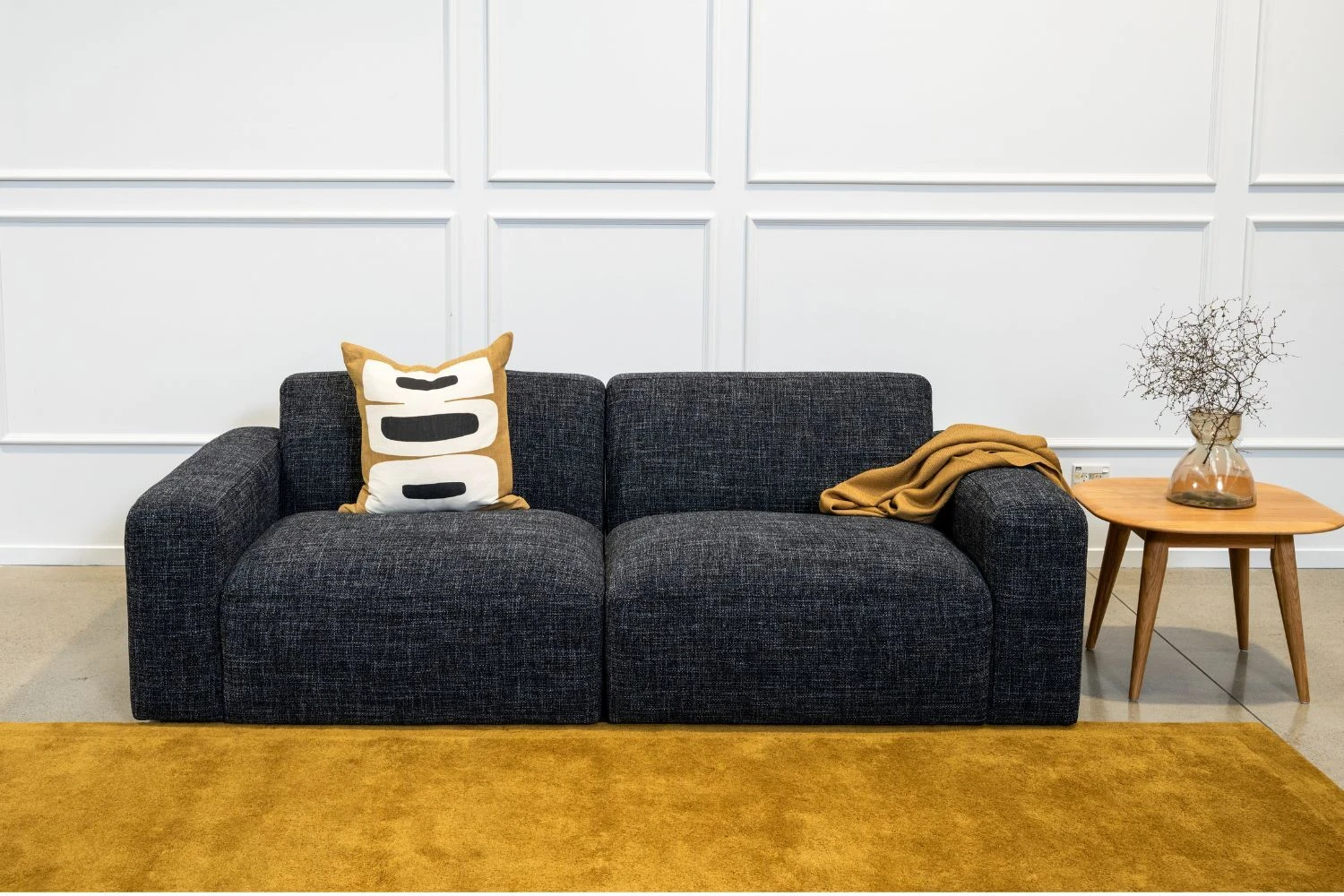 Bailey Sofa styled with a cosy throw and winter-tone cushions