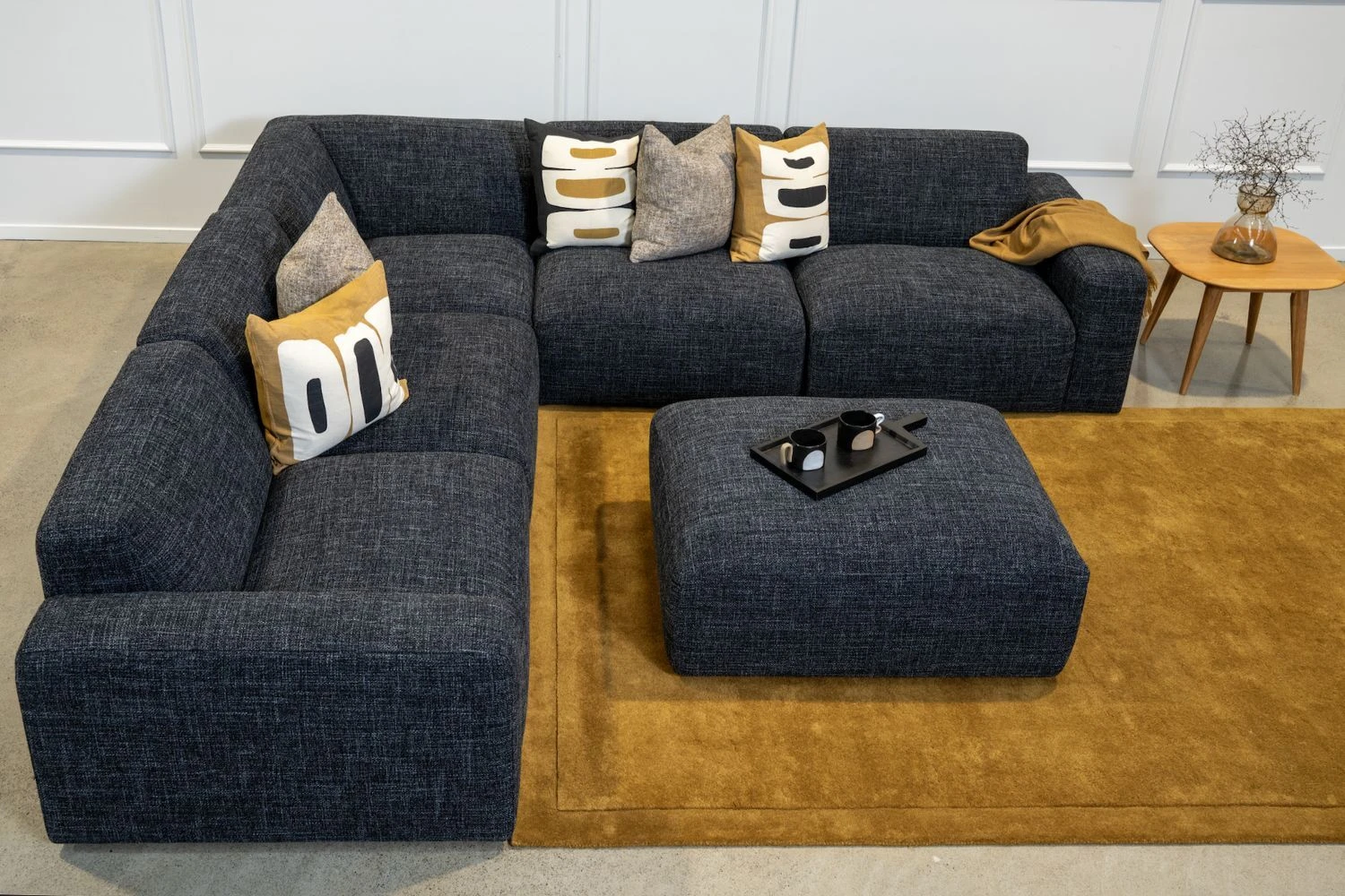 Malone Modular Corner Suite styled with a large rug