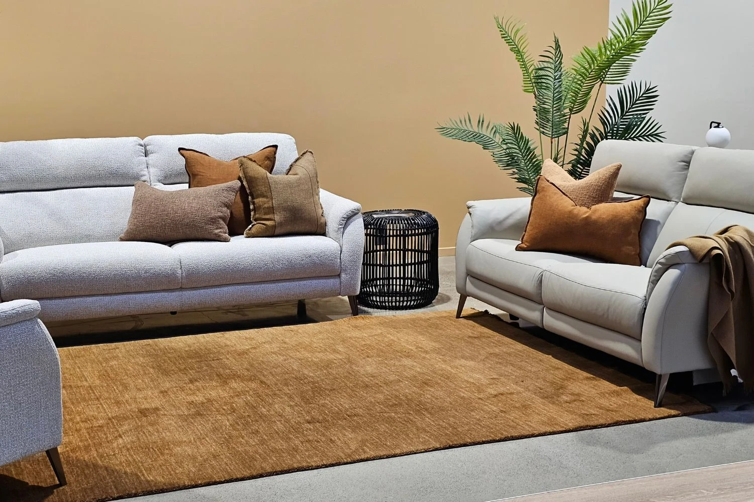 Bailey Sofa styled fresh with patterned cushions and a statement rug