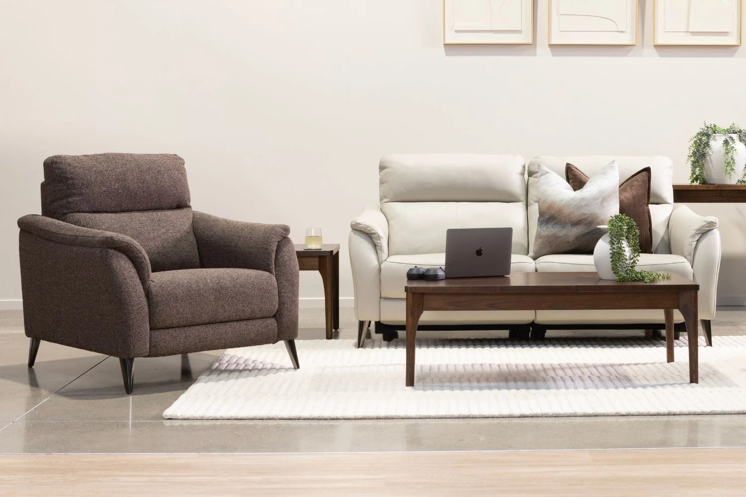Bailey Sofa styled rich and cosy with dark tone cushions and a statement occasional chair