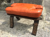 Handmade Moroccan Camel Saddle stool. Orange Leather Cushion