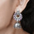Purple Floral Silver Jhumkis