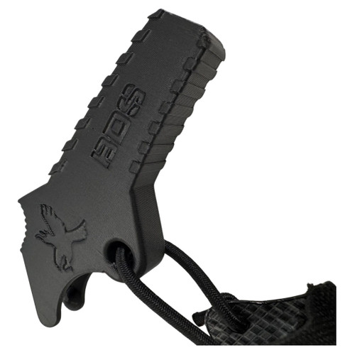 BRB BreachCap protective spike cover — black, close-up on retention cord BRB BreachCap protective spike cover — black, close-up on retention cord
