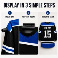 Stinky Lockers Sports Jersey Wall Mount (3-Pack), an easy-to-use display for sports jerseys shown on a hockey jersey mounted on the wall, demonstrating the three-step installation process.