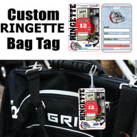 Stinky Lockers Personalized Ringette Luggage Tag with Loop-OTO attached to a black sports bag, showcasing the product with a hockey theme including a jersey, hockey equipment, and team logos.