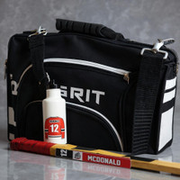 Stinky Lockers Ringette Stick Label & Pro Jersey Water Bottle Decal Combo, black sports bag with hockey equipment including water bottle and stick, featuring decals and labels for team organization.