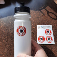 Custom baseball bat knob decal designed for travel baseball teams to label bats with player names and numbers.