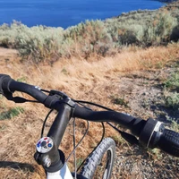 Personalized bike top cap decal installed on a mountain bike with waterproof vinyl graphics designed for rugged trail riding.