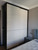 Custom sliding door wardrobe in Singapore bedroom — Shuno by Arimokko, full front view
