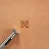 Geometric leather stamp with the impression.