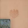 Crest stamp with is leather impression.