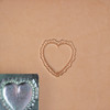 Heart stamp with the leather impression it creates. 