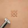 Geometric stamp with its leather impression.