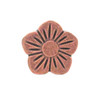 Front of a flower petal antique copper concho.