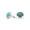 Turquoise spots with nickel rims in 5/16" diameter backside.
