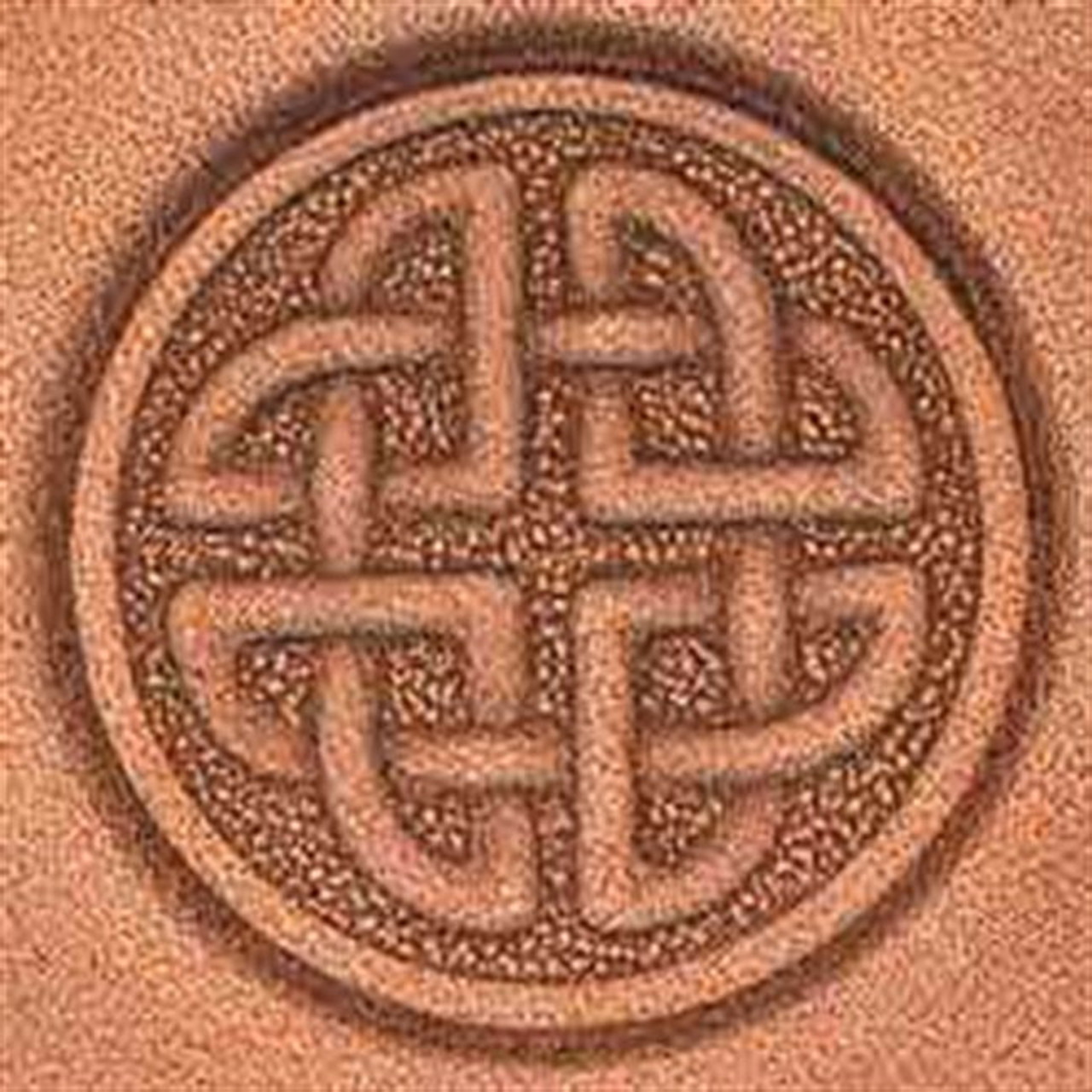 Round Celtic stamps impression close up. 